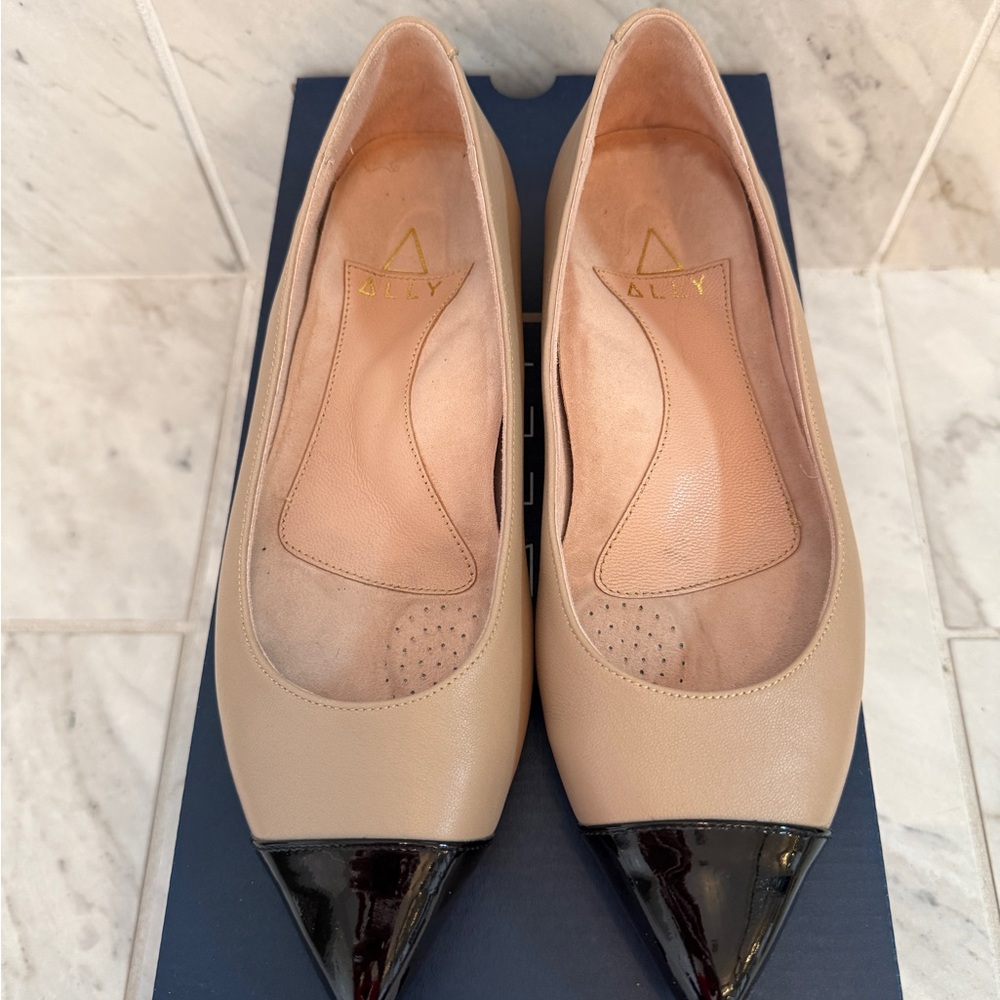Cream and Black Pointed Toe Flats for Versatile Style